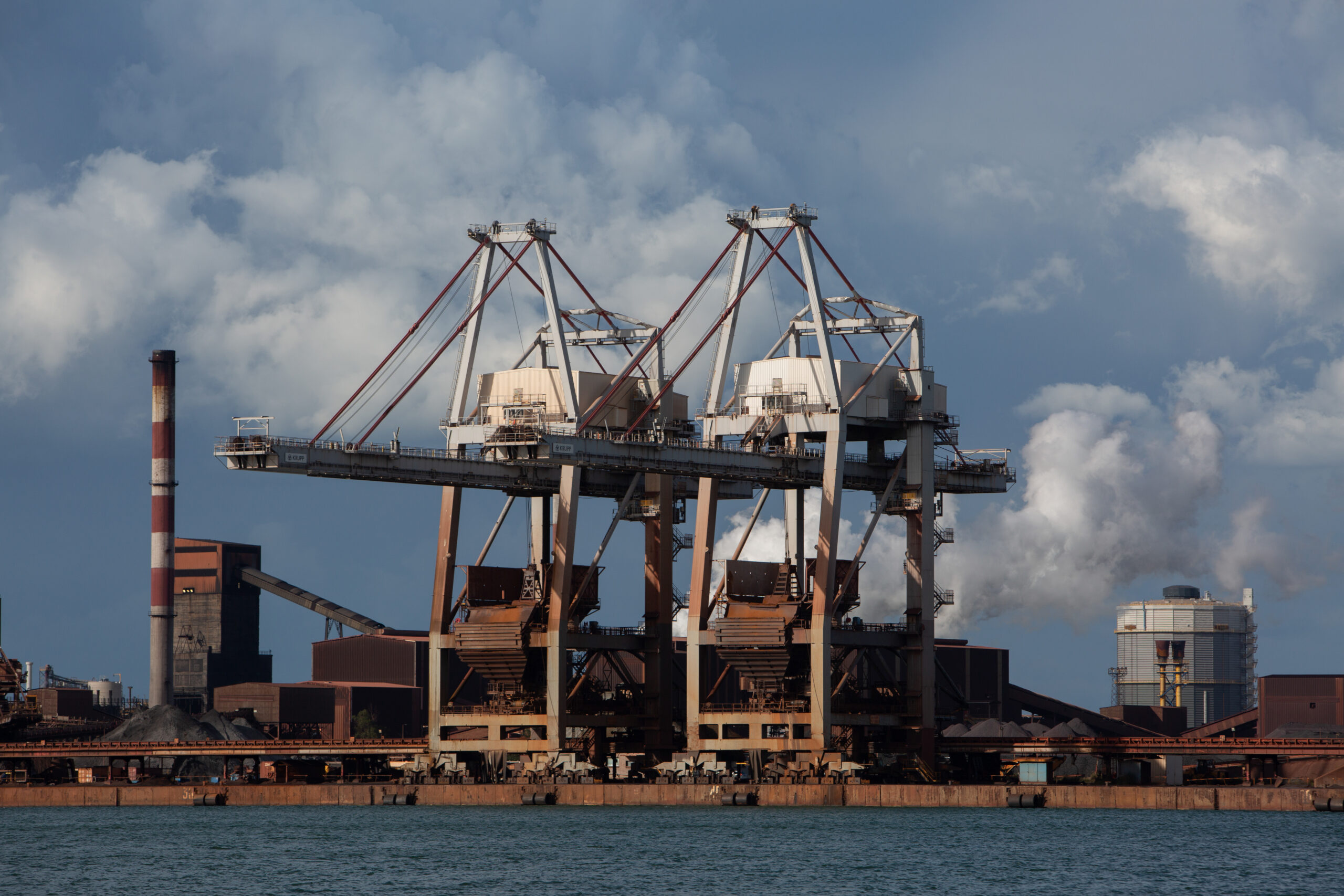 Marseille, 7 May 2024: SteelWatch banner action, with ‘Red Rebels’, allies and local activists, in front of Arcelor Mittal steel production plant in Fos-Sur-Mer, France, on 7 May 2024.